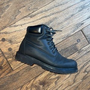 Woman’s black work boots